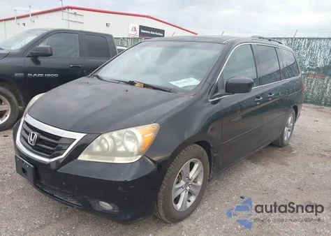 2010 Honda Odyssey Touring from USA, damaged, VIN 5FNRL3H97AB030411